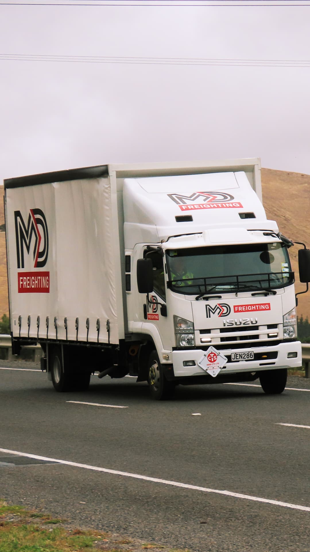 MD Freighting truck on a Marlborough road